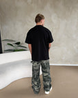 CAMISETA OVERSIZE CON RELIEVE TONAL NEGRA