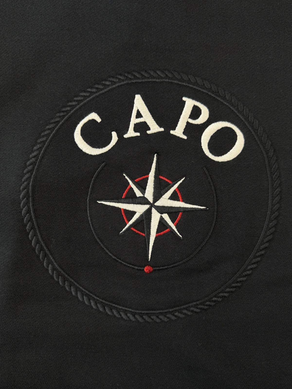 SUDADERA JUNIOR CON CAPUCHA COMPASS NEGRA